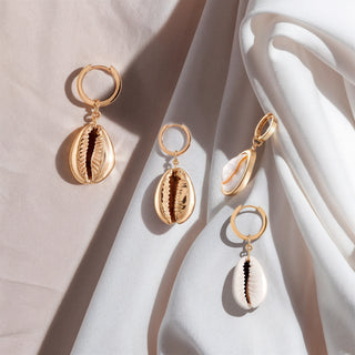 4 gold cowrie shells for hair